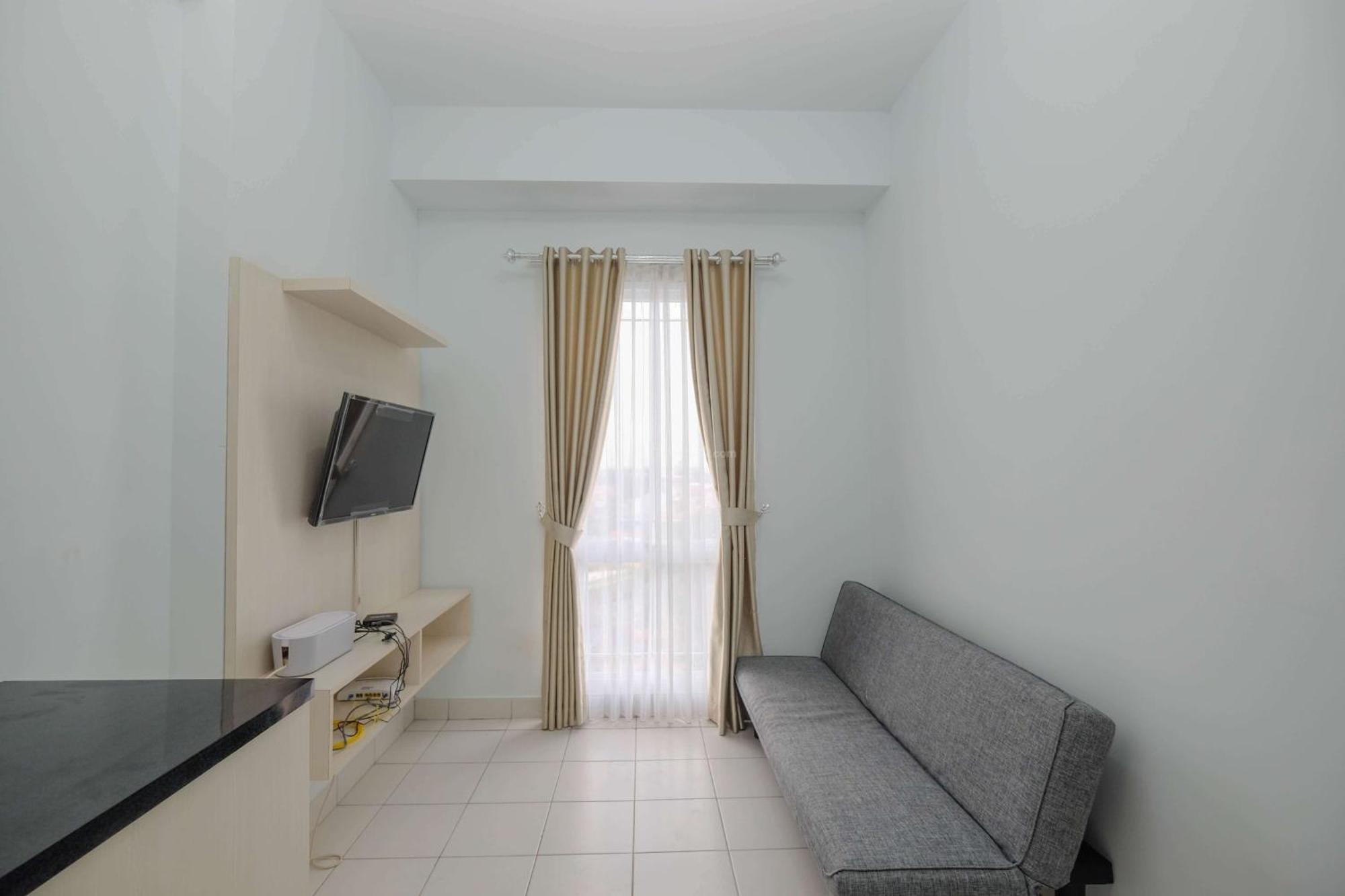 Comfy And Homey 2br At Patraland Urbano By Travelio Apartemen *