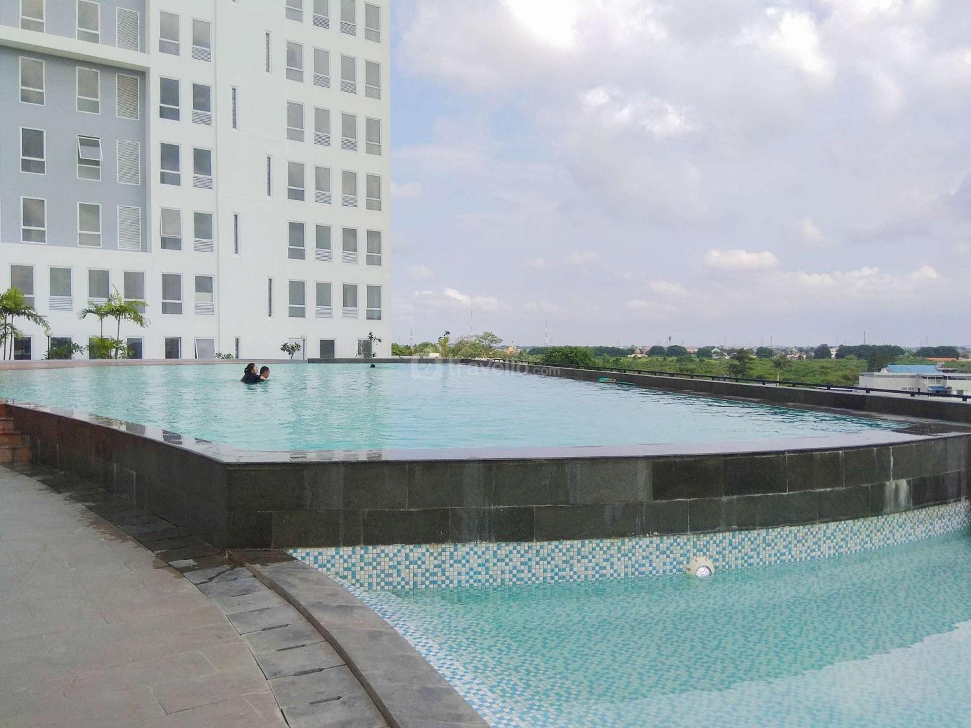 Comfy And Homey 2br At Patraland Urbano By Travelio Apartemen *